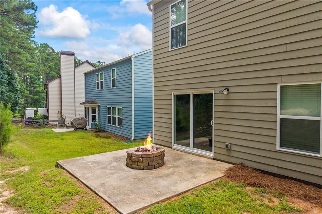 71 Moonrise Crossing Dallas, GA 30132 - Photo 50 of 64 a front view of house with yard