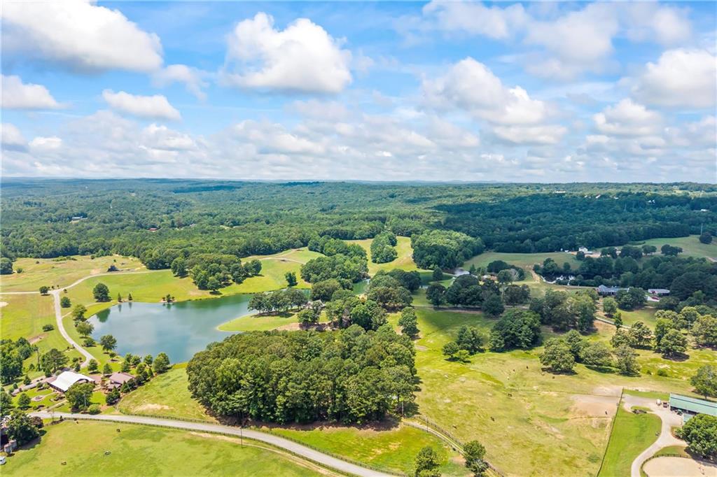 71 Moonrise Crossing Dallas, GA 30132 - Photo 62 of 64 a view of a lake with mountains in the background
