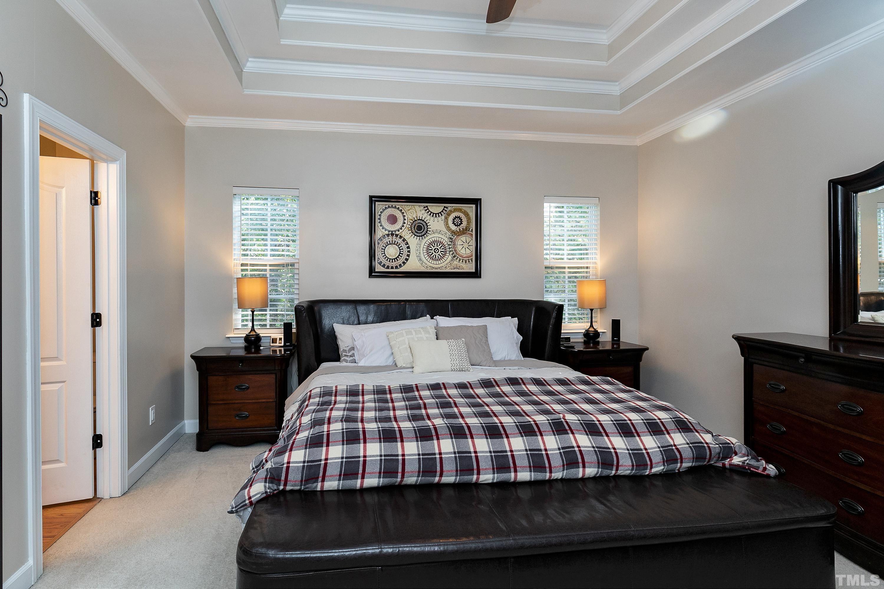 7025 Onslow Stephenson Road Willow Spring, NC 27592 - Photo 11 of 30 a bedroom with a bed and dresser
