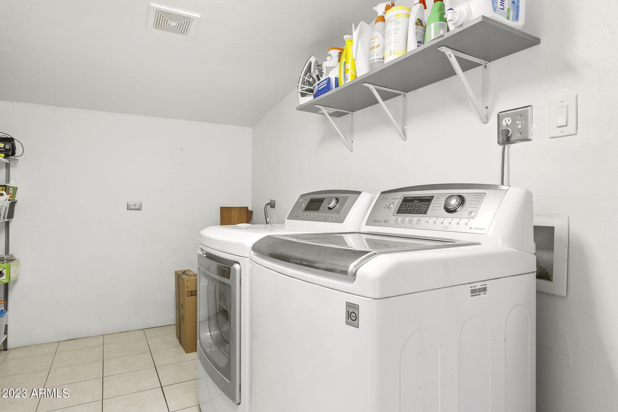 4137 East Granada Road Phoenix, AZ 85008 - Photo 40 of 59 Inside laundry room with storage