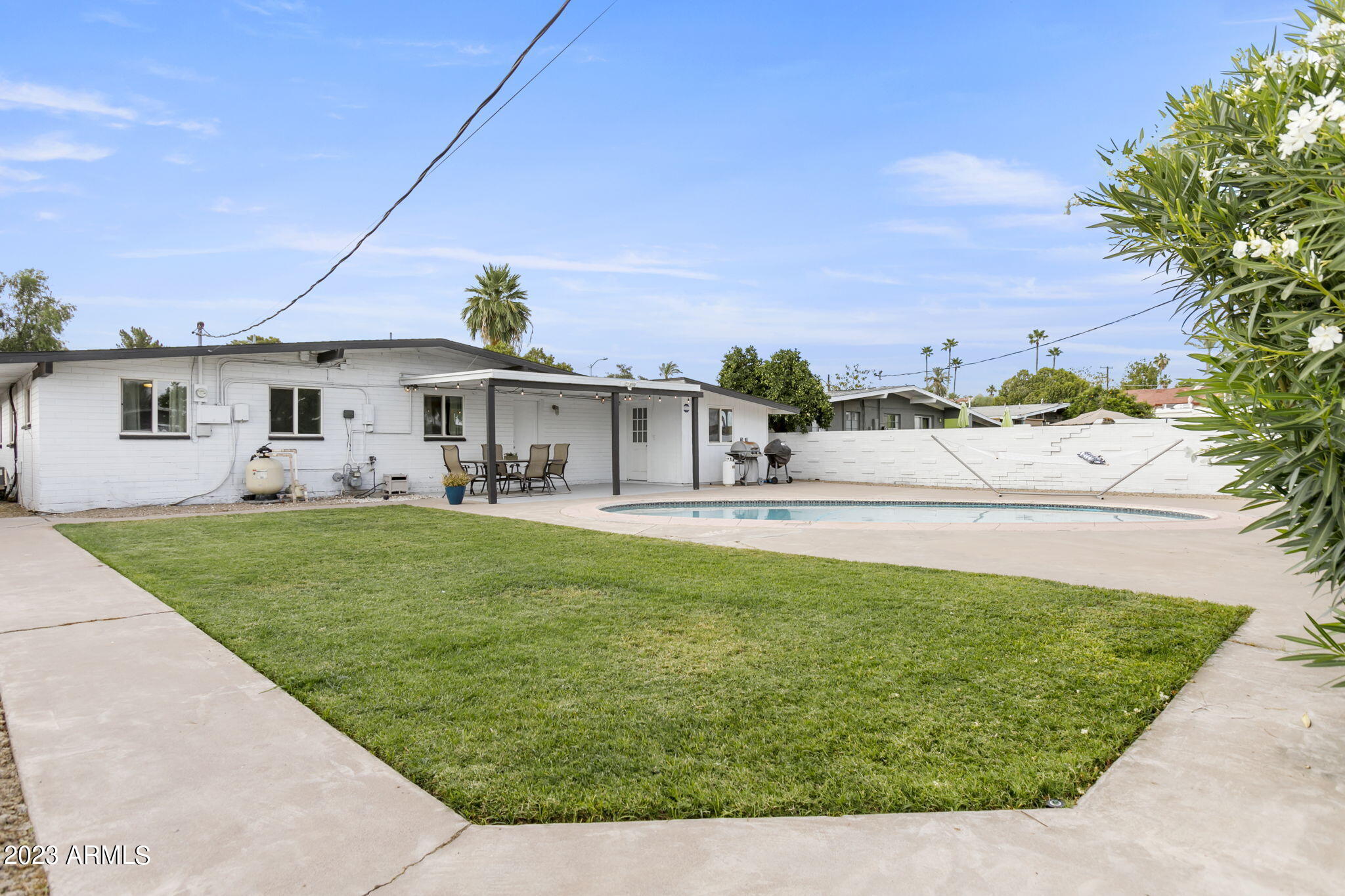 4137 East Granada Road Phoenix, AZ 85008 - Photo 47 of 59 Lawn area with sprinklers