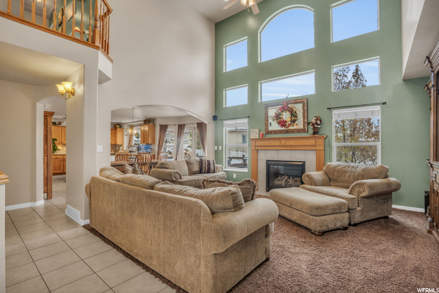 6357 South Andes Way Salt Lake City, UT 84129 - Photo 1 of 1 Naturally light floods in through the 2 stories of windows.