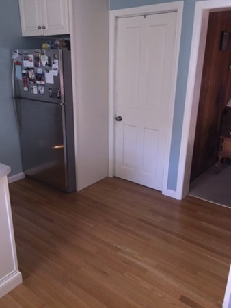 15 3rd Street Ayer, MA 01432 - Photo 7 of 8 an empty room with wooden floor and closet