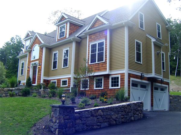 136 Packard Road Stow, MA 01775 - Photo 1 of 1 a front view of a house with garden