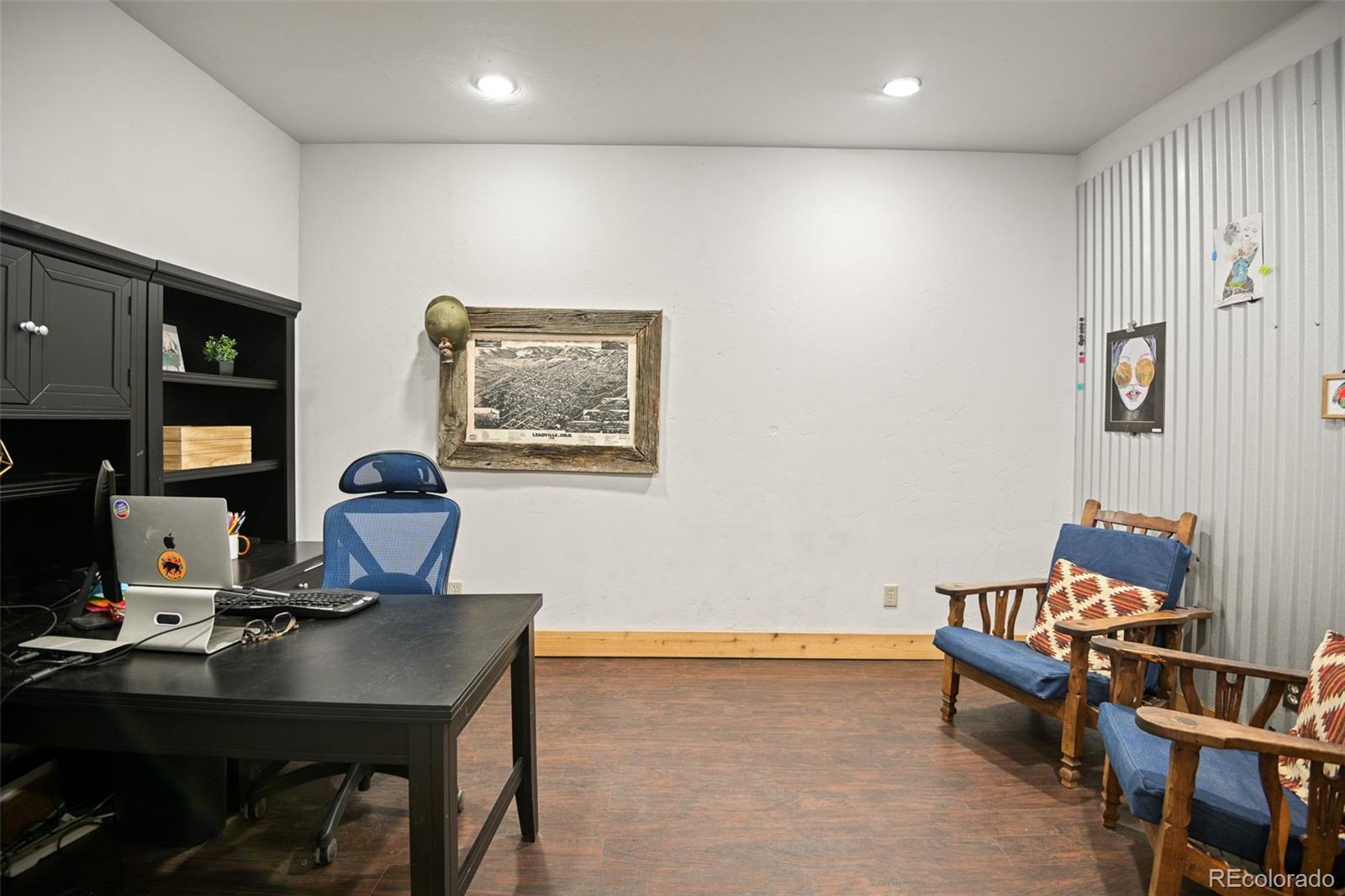 13434 Baird Road Conifer, CO 80433 - Photo 24 of 36 a work room with furniture and piano table