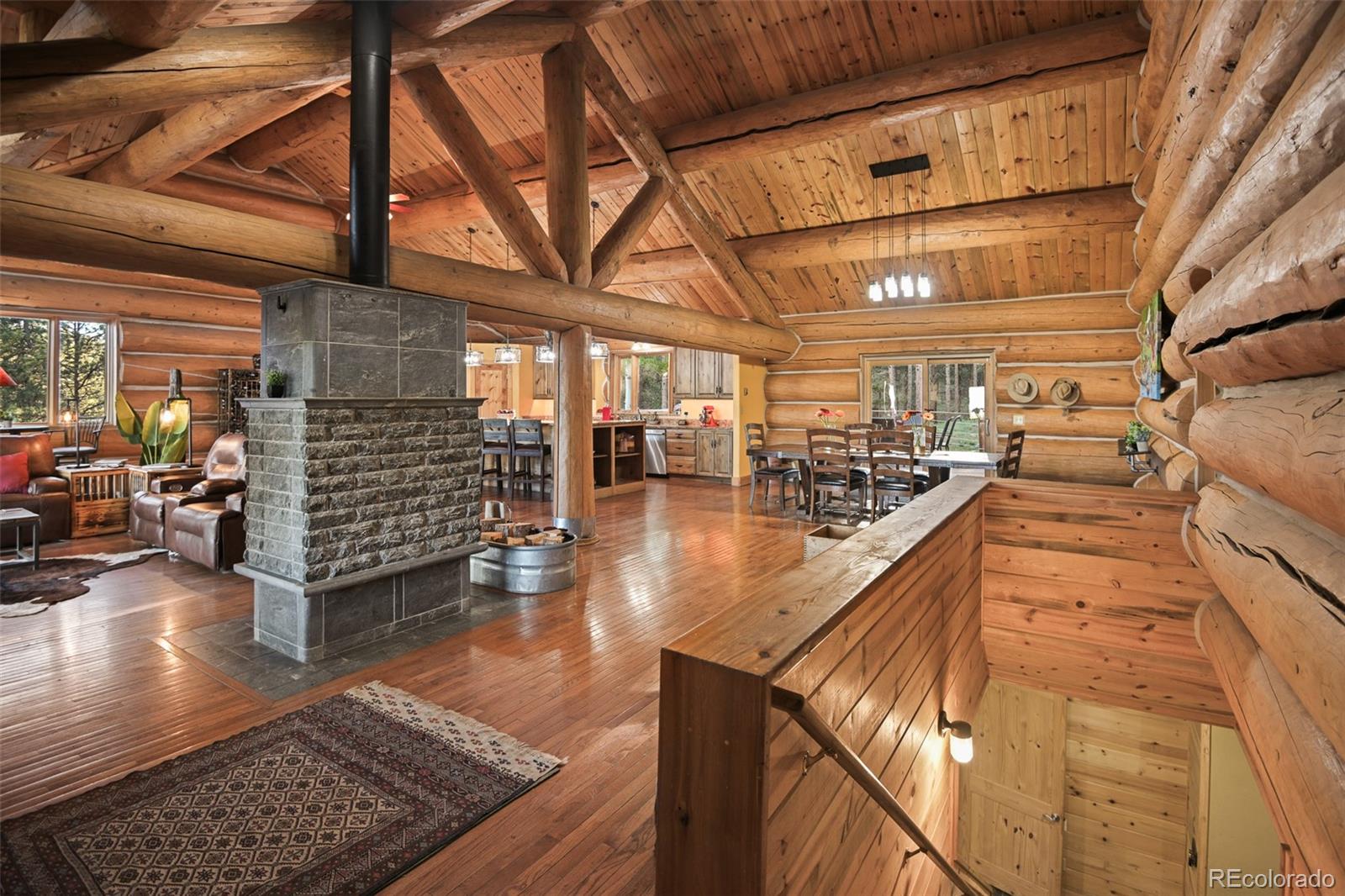 13434 Baird Road Conifer, CO 80433 - Photo 3 of 36 a view of a living room with furniture