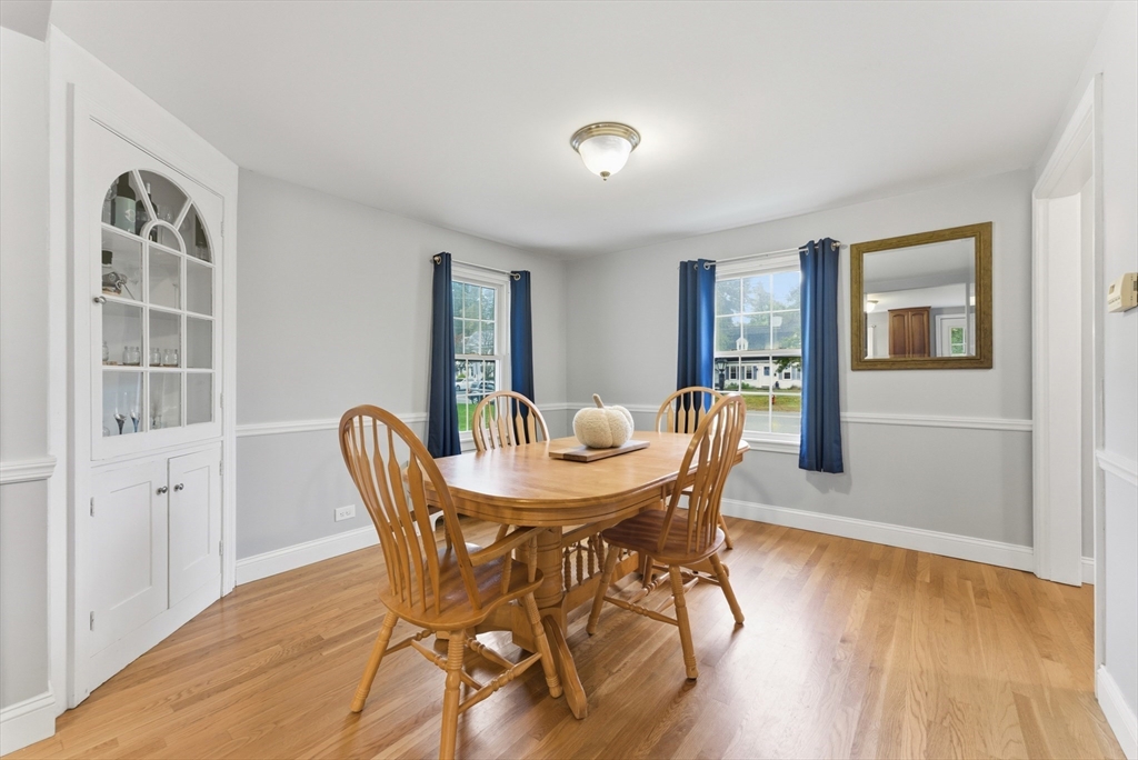 54 Churchill Road West Springfield, MA 01089 - Photo 11 of 42 a view of a dining room with furniture and wooden floor