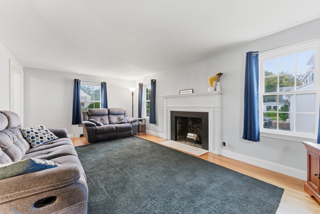 54 Churchill Road West Springfield, MA 01089 - Photo 13 of 42 a living room with furniture and a fireplace