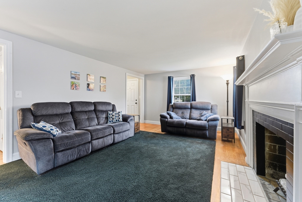 54 Churchill Road West Springfield, MA 01089 - Photo 14 of 42 a living room with furniture and a fireplace