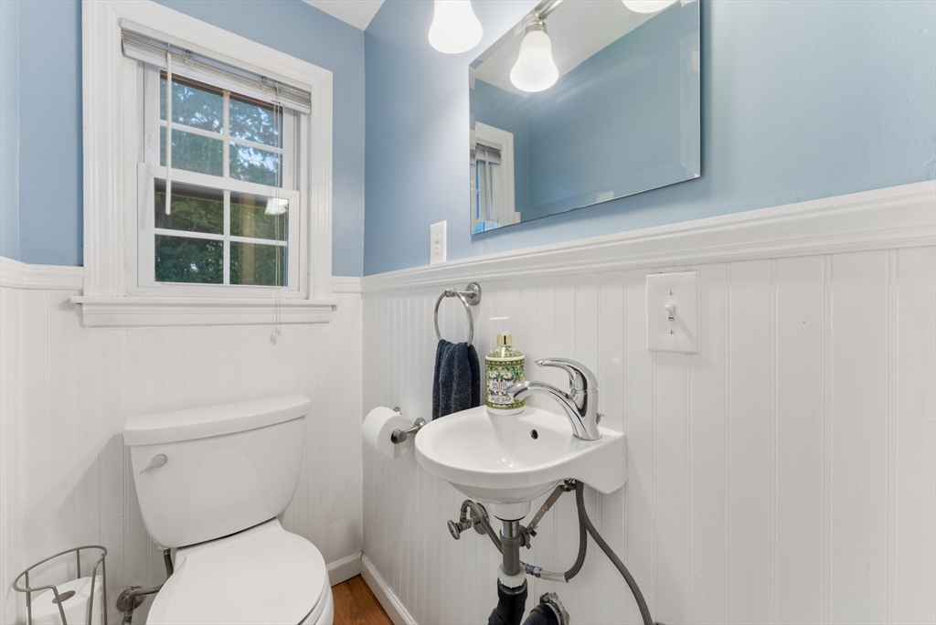 54 Churchill Road West Springfield, MA 01089 - Photo 17 of 42 a bathroom with a sink a toilet and mirror