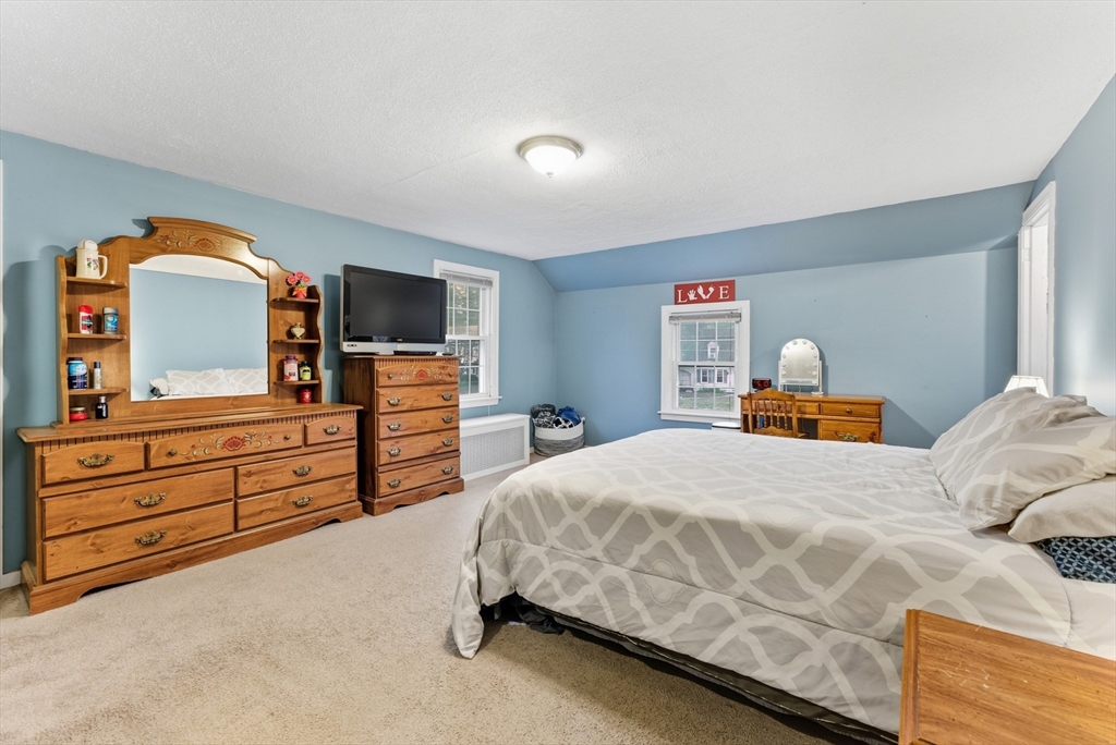 54 Churchill Road West Springfield, MA 01089 - Photo 18 of 42 a bedroom with a bed and a television