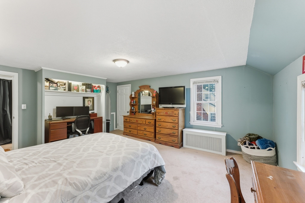 54 Churchill Road West Springfield, MA 01089 - Photo 20 of 42 a bedroom with a bed and furniture