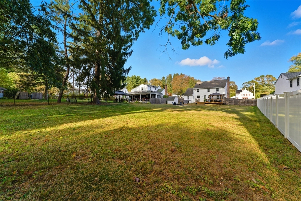 54 Churchill Road West Springfield, MA 01089 - Photo 2 of 42 a view of yard with swimming pool and green space