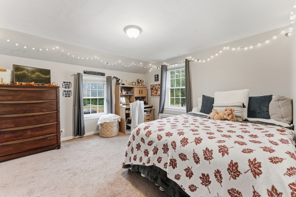 54 Churchill Road West Springfield, MA 01089 - Photo 23 of 42 a bedroom with a bed and walk in closet