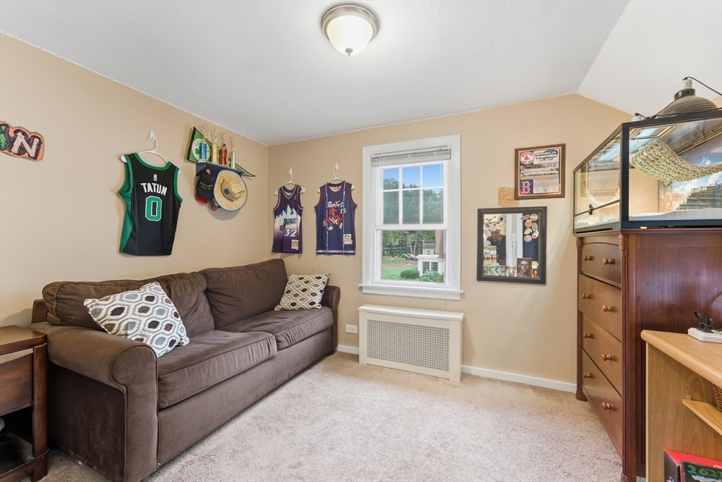 54 Churchill Road West Springfield, MA 01089 - Photo 26 of 42 a living room with furniture and a window