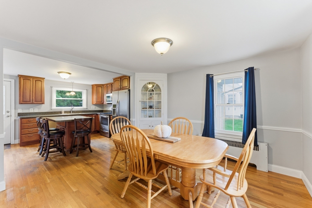 54 Churchill Road West Springfield, MA 01089 - Photo 10 of 42 a dining room with furniture garden view and wooden floor