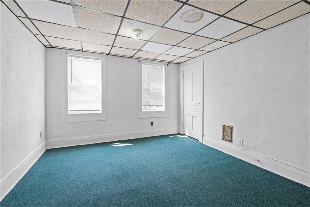 701 Freeport Road Creighton, PA 15030 - Photo 5 of 26 a view of an empty room with a window
