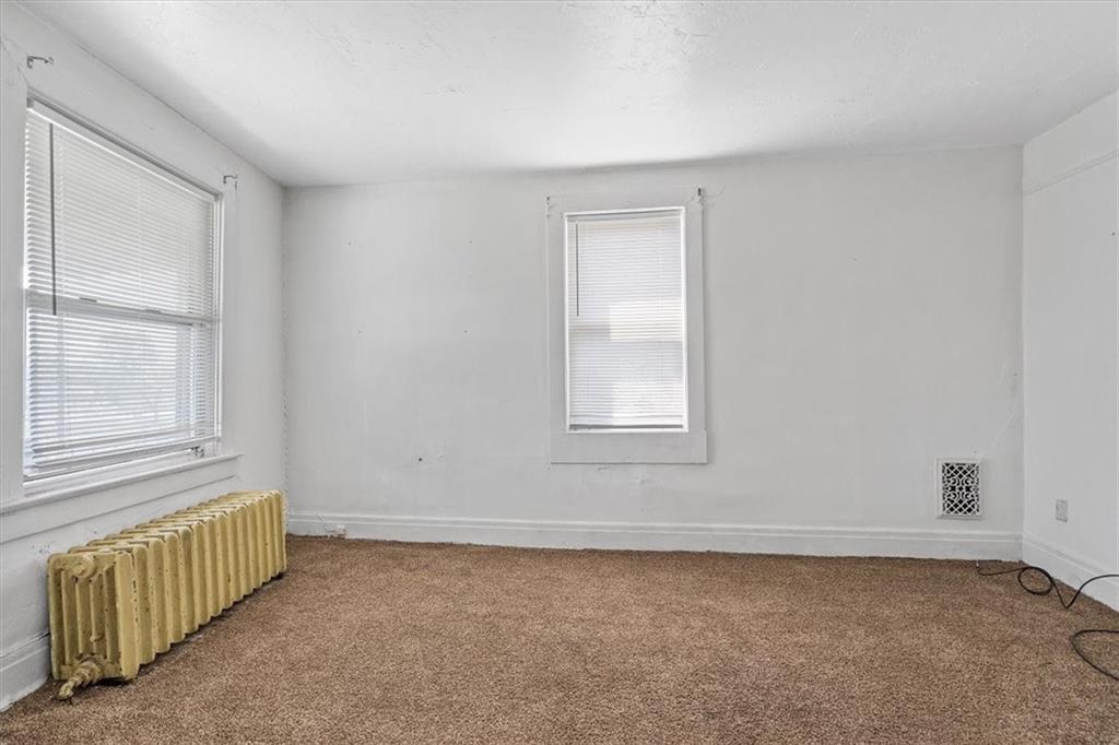 701 Freeport Road Creighton, PA 15030 - Photo 8 of 26 an empty room with a window