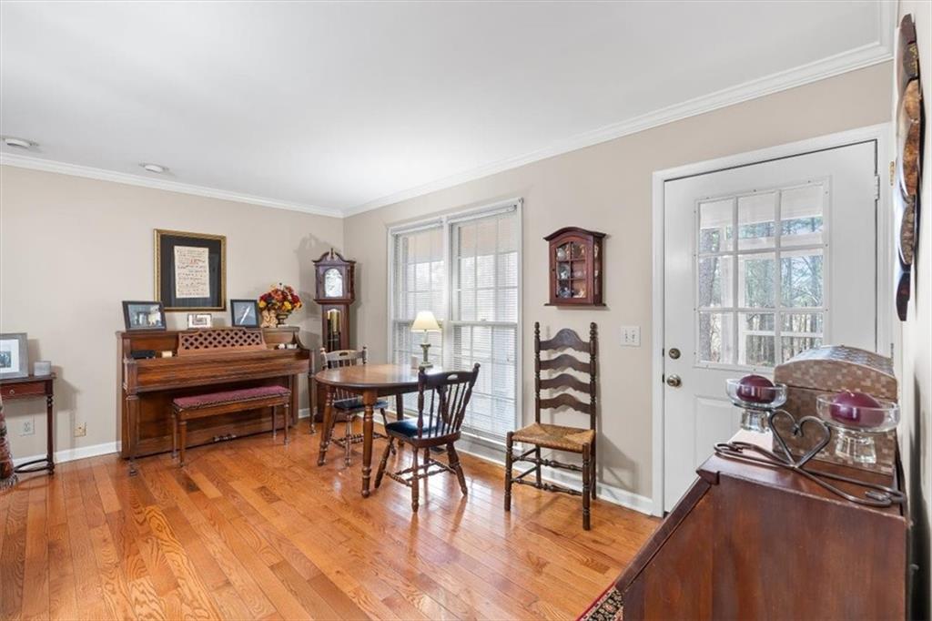 455 M M Sanders Road Buchanan, GA 30113 - Photo 23 of 65 a living room with furniture and wooden floor