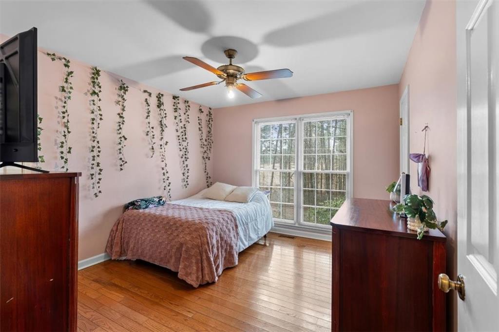 455 M M Sanders Road Buchanan, GA 30113 - Photo 30 of 65 a bedroom with a bed and a window