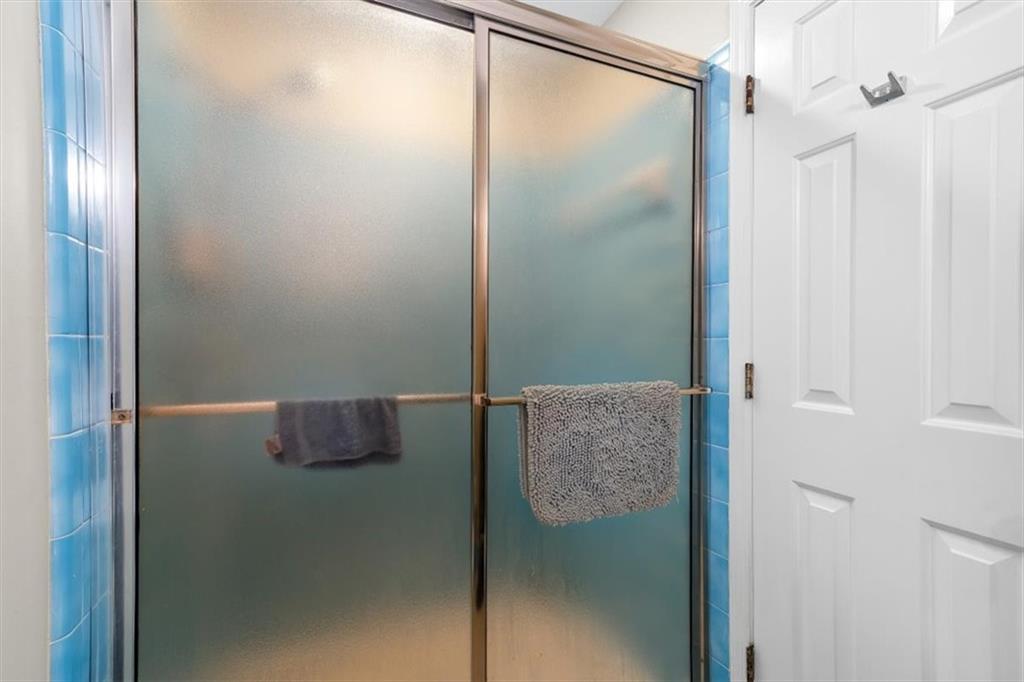 455 M M Sanders Road Buchanan, GA 30113 - Photo 32 of 65 a bathroom with a shower