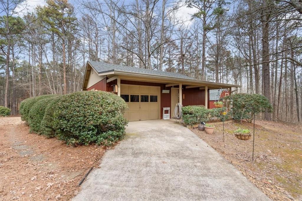 455 M M Sanders Road Buchanan, GA 30113 - Photo 34 of 65 front view of a house with a yard