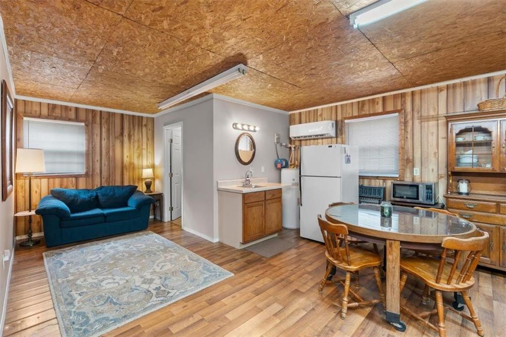 455 M M Sanders Road Buchanan, GA 30113 - Photo 39 of 65 a dining room with furniture and window