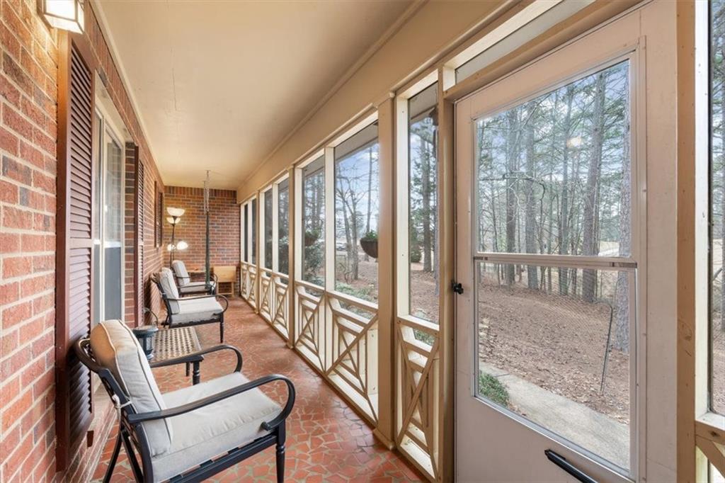 455 M M Sanders Road Buchanan, GA 30113 - Photo 43 of 65 a view of an entryway with wooden floor and windows