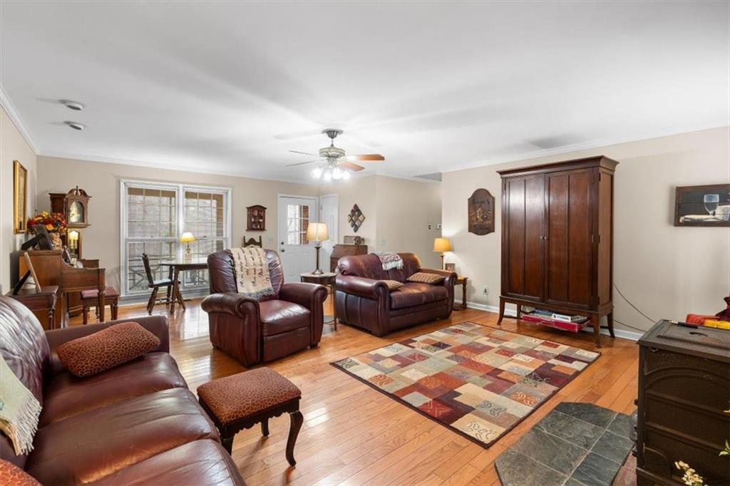 455 M M Sanders Road Buchanan, GA 30113 - Photo 9 of 65 a living room with furniture rug and window