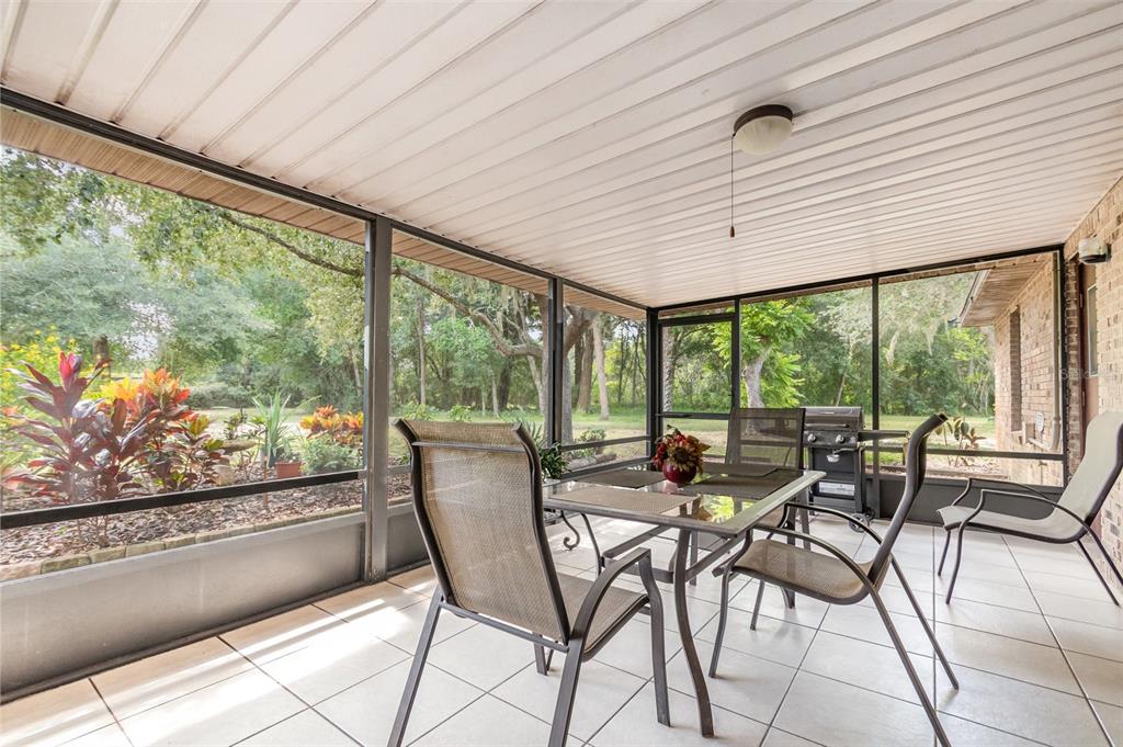 155 11th Avenue Osteen, FL 32764 - Photo 22 of 42 a outdoor space with chairs