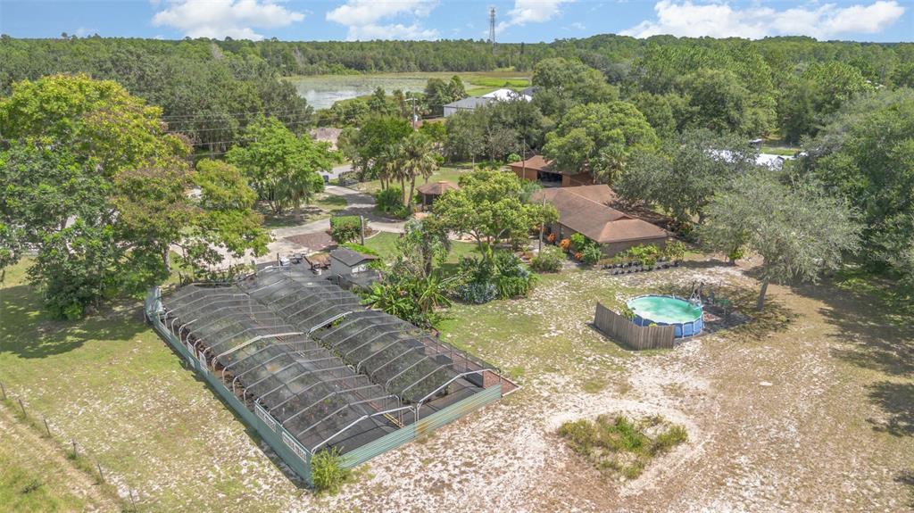 155 11th Avenue Osteen, FL 32764 - Photo 38 of 42 a view of a yard with an outdoor seating