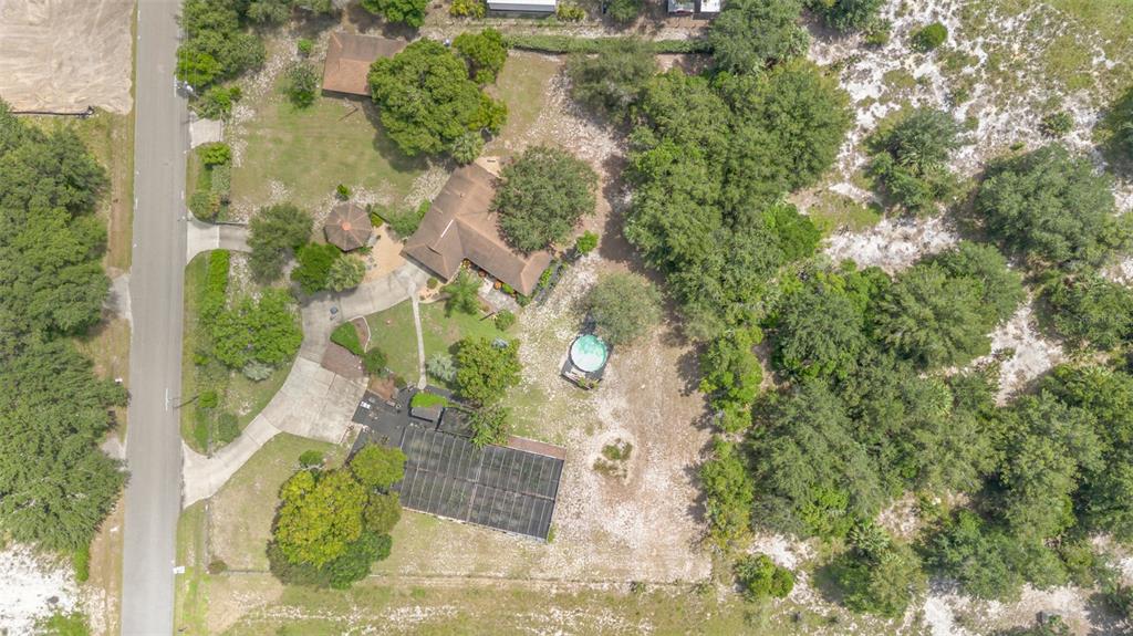 155 11th Avenue Osteen, FL 32764 - Photo 39 of 42 an aerial view of a house with a yard