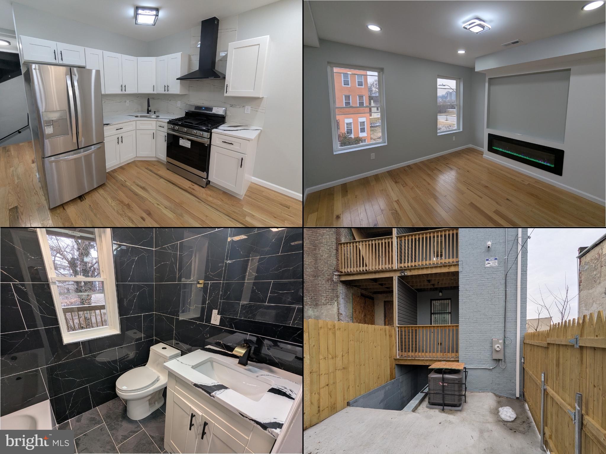 a kitchen with a sink appliances and cabinets
