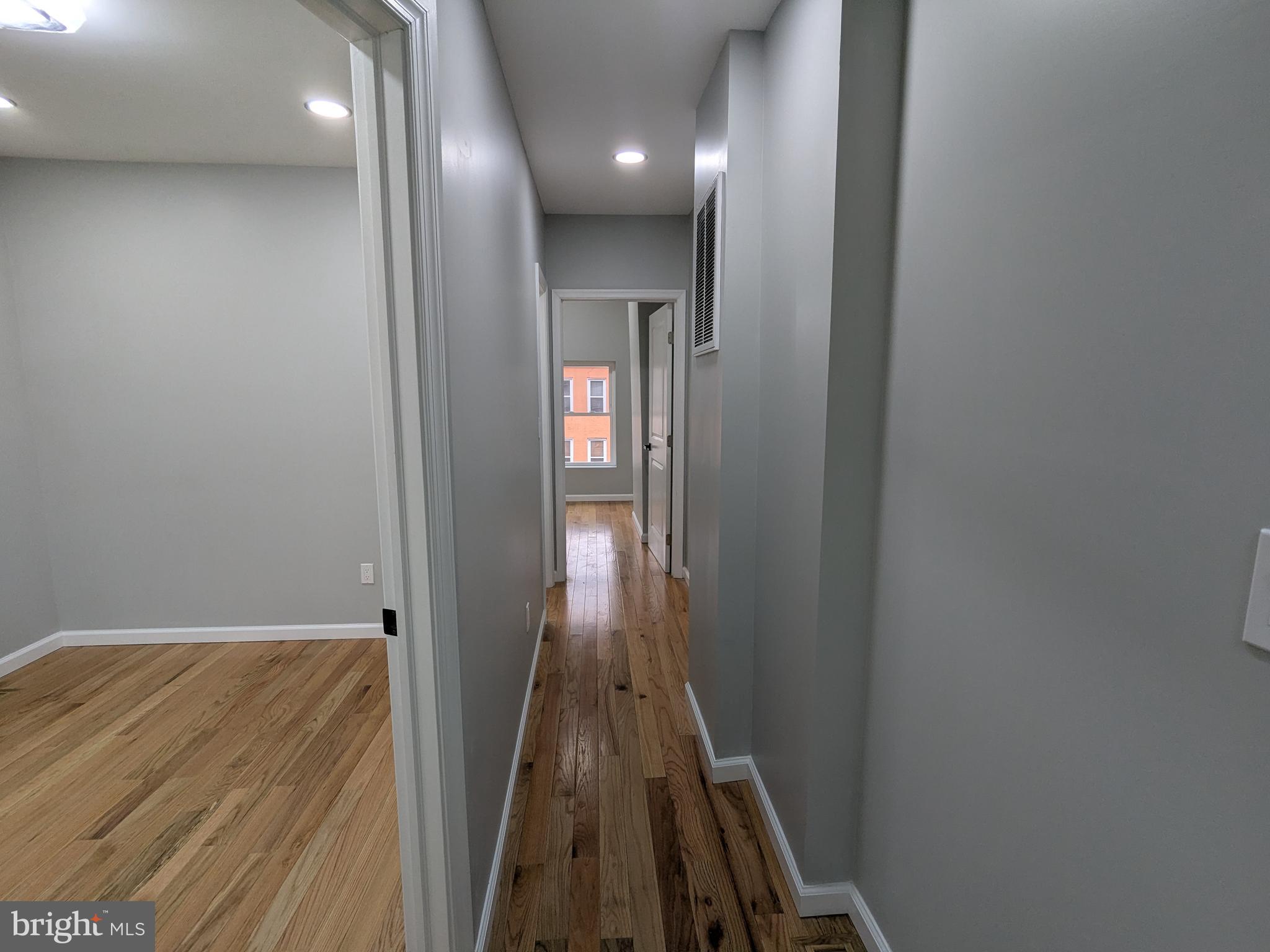 504 North Schroeder Street Baltimore, MD 21223 - Photo 16 of 32 a view of hallway with stairs
