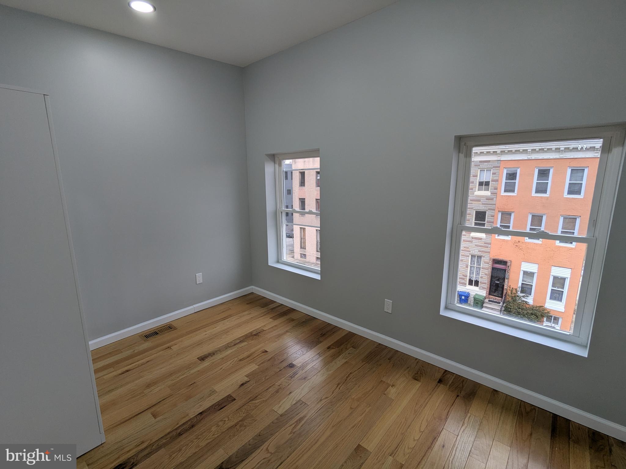 504 North Schroeder Street Baltimore, MD 21223 - Photo 20 of 32 a view of an empty room and window