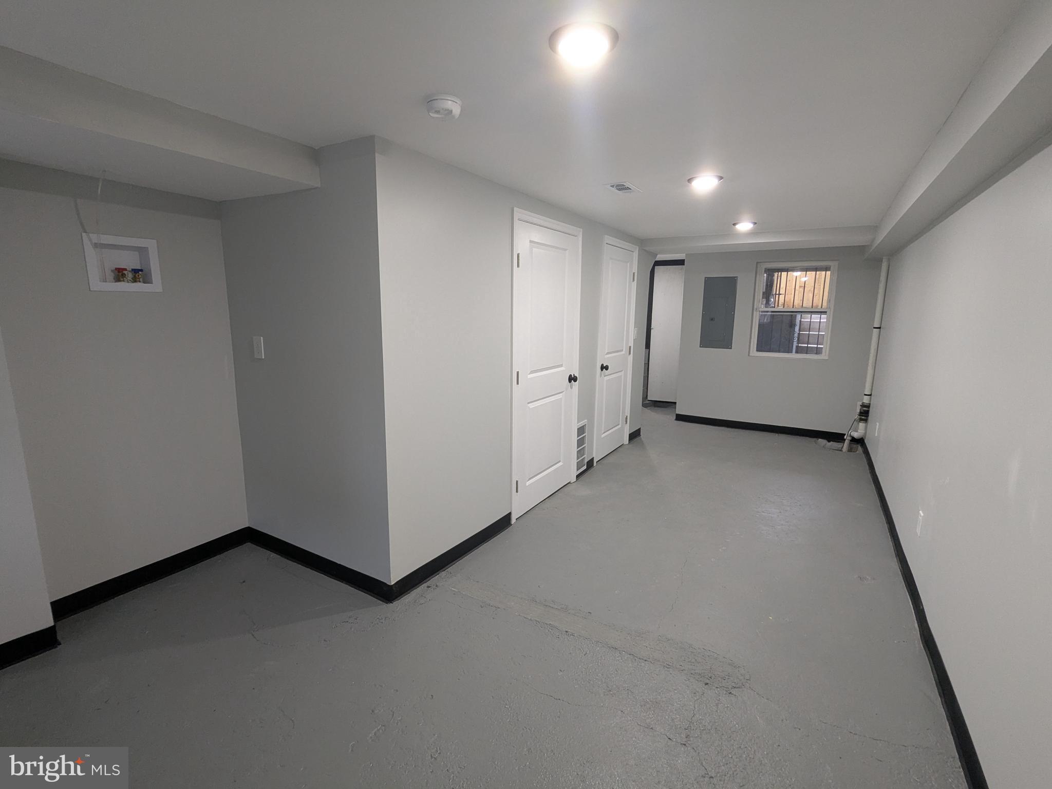 504 North Schroeder Street Baltimore, MD 21223 - Photo 25 of 32 an empty room with windows