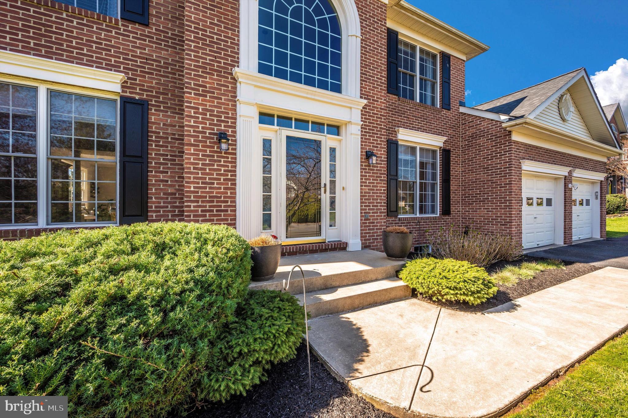 6701 Kings Mill Court Frederick, MD 21702 - Photo 37 of 54 brick front with mature landscaping and new roof