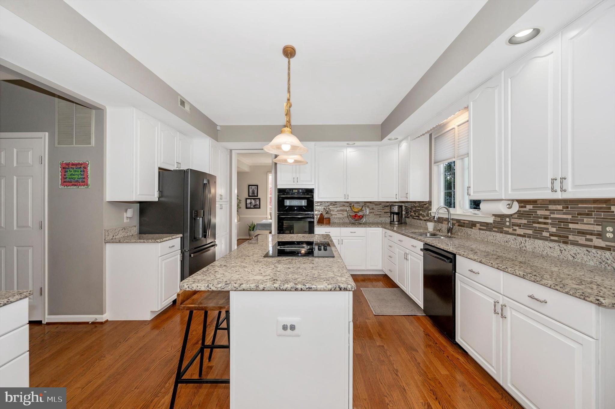 6701 Kings Mill Court Frederick, MD 21702 - Photo 7 of 54 huge island and modern backsplash