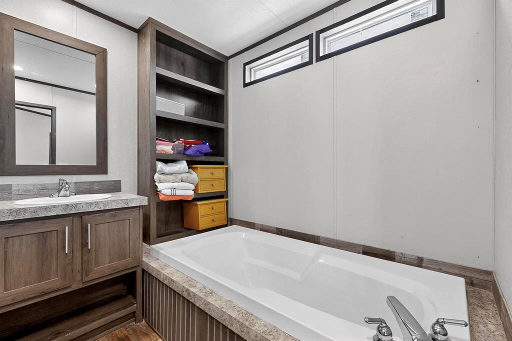 8450 North Farm To Market 148 Terrell, TX 75160 - Photo 21 of 38 Full bath with vanity and a garden tub