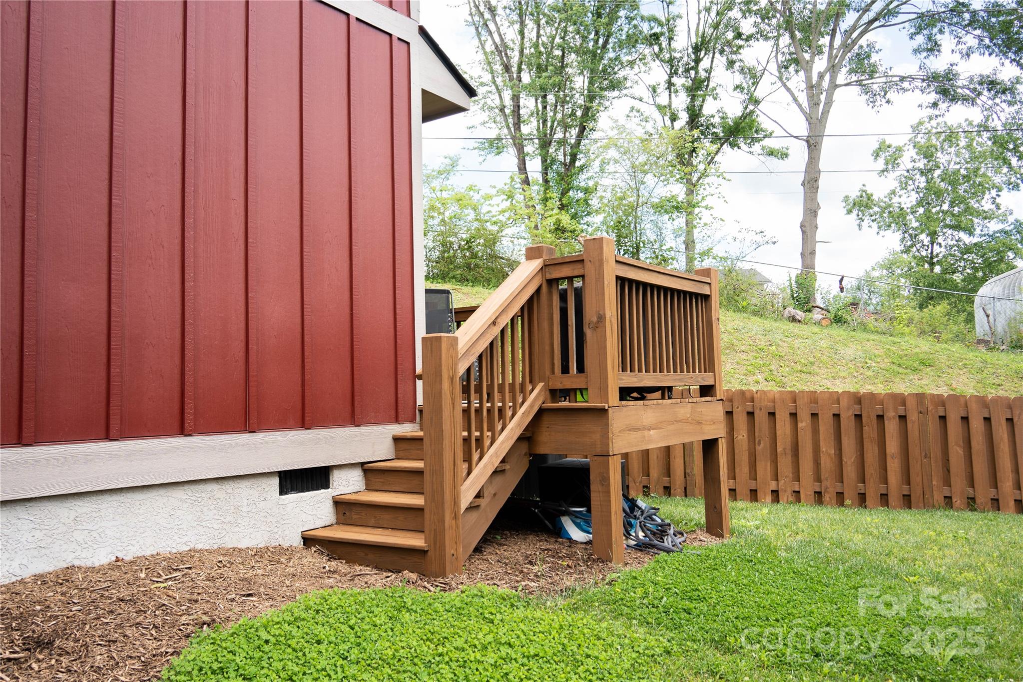 104 Wheeler Road Weaverville, NC 28787 - Photo 27 of 38 a view of a deck with a big yard and large trees