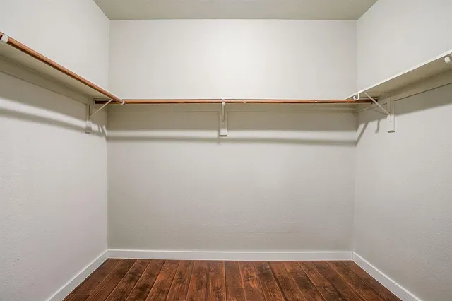 a view of a room with racks on the wall