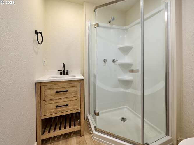 175 7th Street Gervais, OR 97026 - Photo 21 of 24 a bathroom with a shower and a sink