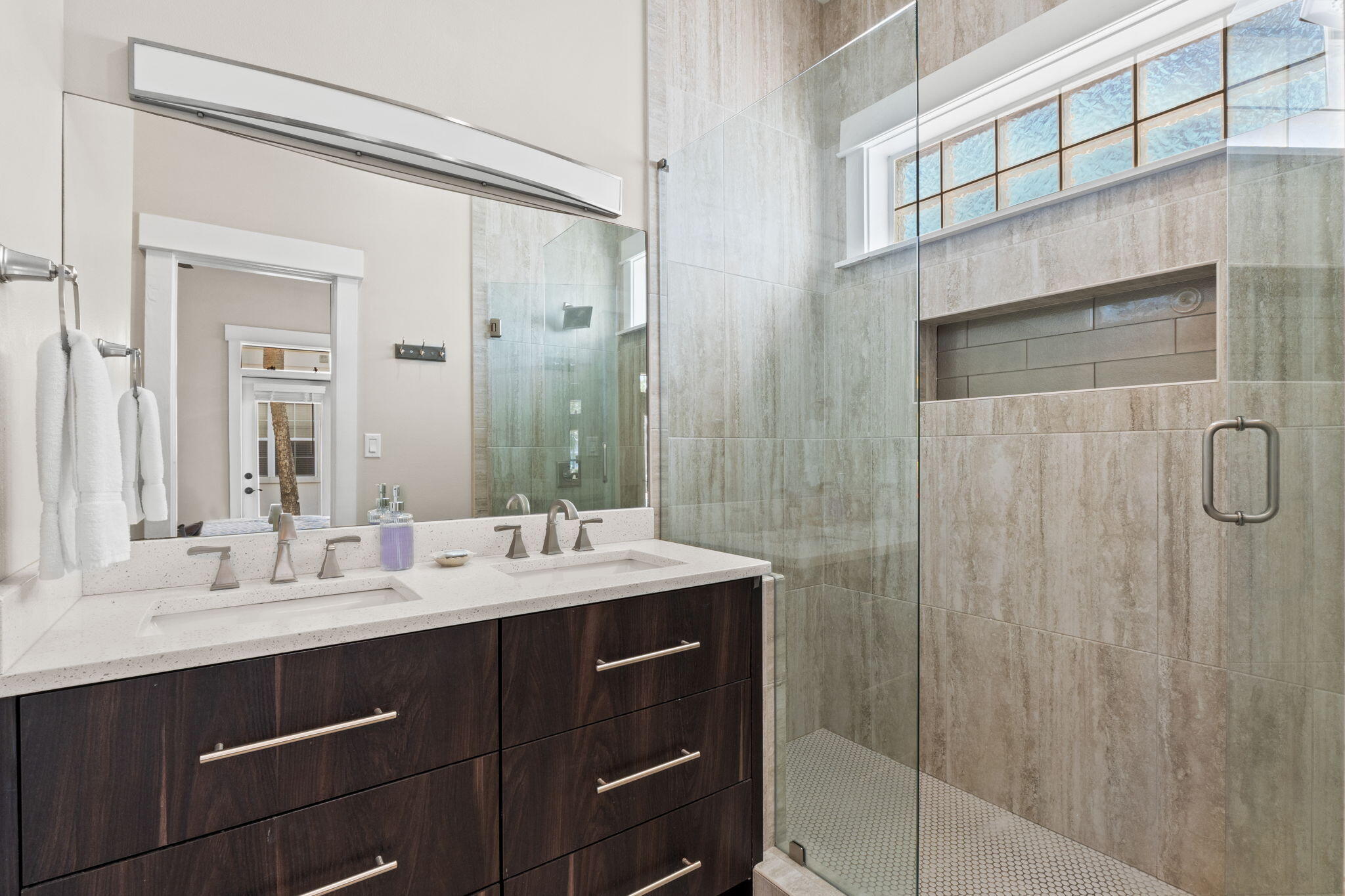 8329 East County Highway 30A, Unit 8 Seacrest, FL 32461 - Photo 7 of 21 a bathroom with a double vanity sink mirror and shower