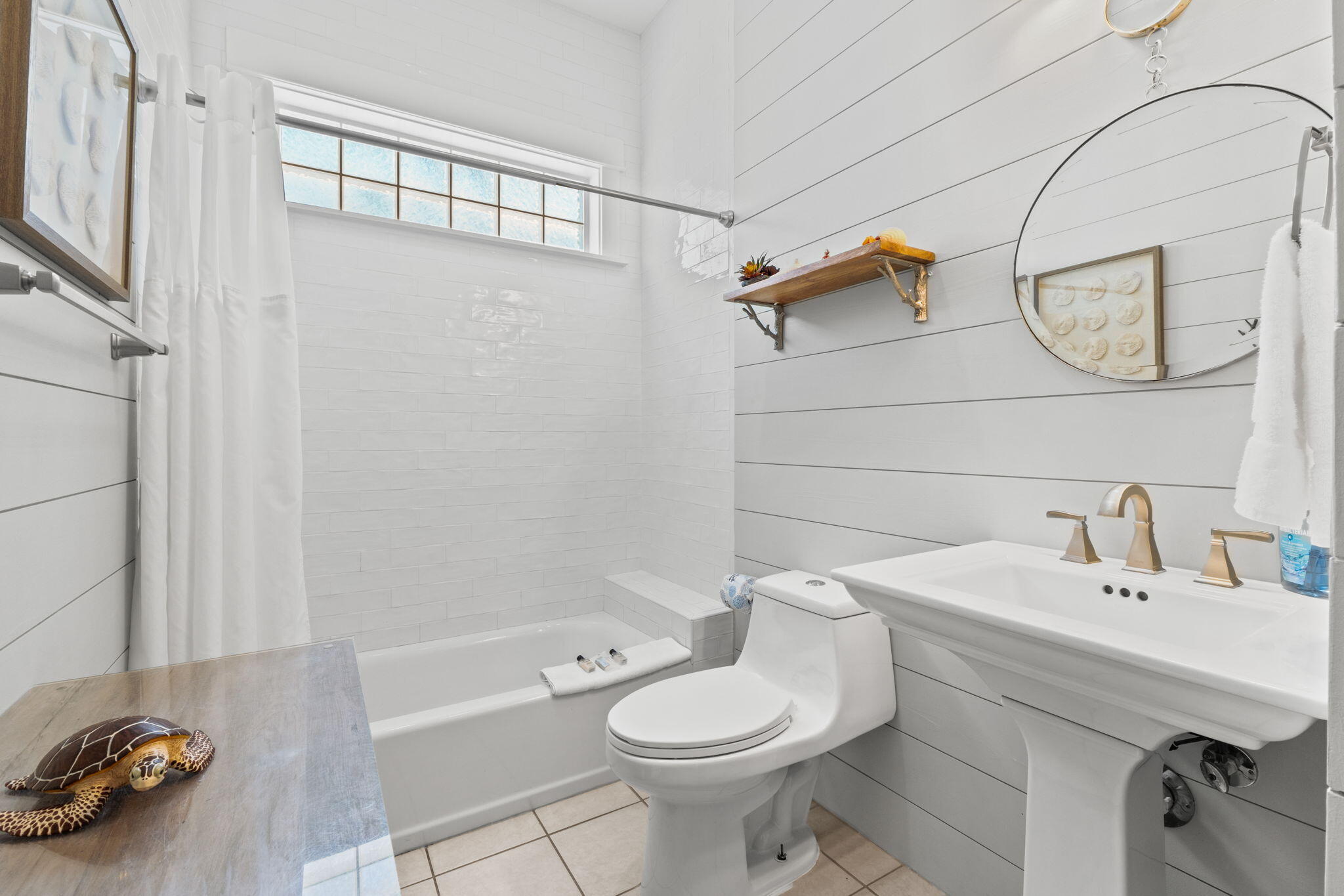 8329 East County Highway 30A, Unit 8 Seacrest, FL 32461 - Photo 10 of 21 a bathroom with a sink a toilet and shower