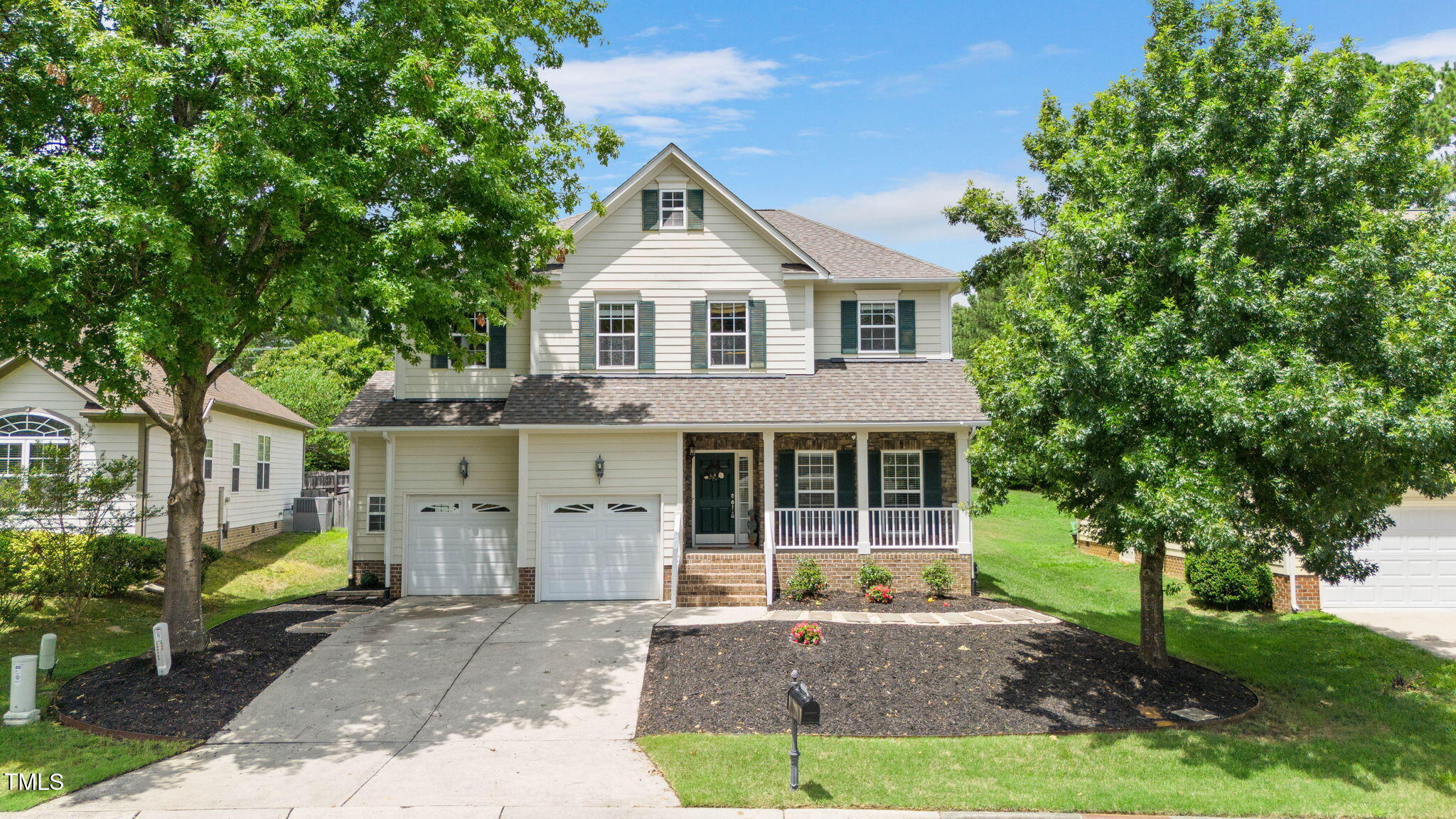 1106 Bellenden Drive Durham, NC 27713 - Photo 1 of 40 a front view of a house with a garden
