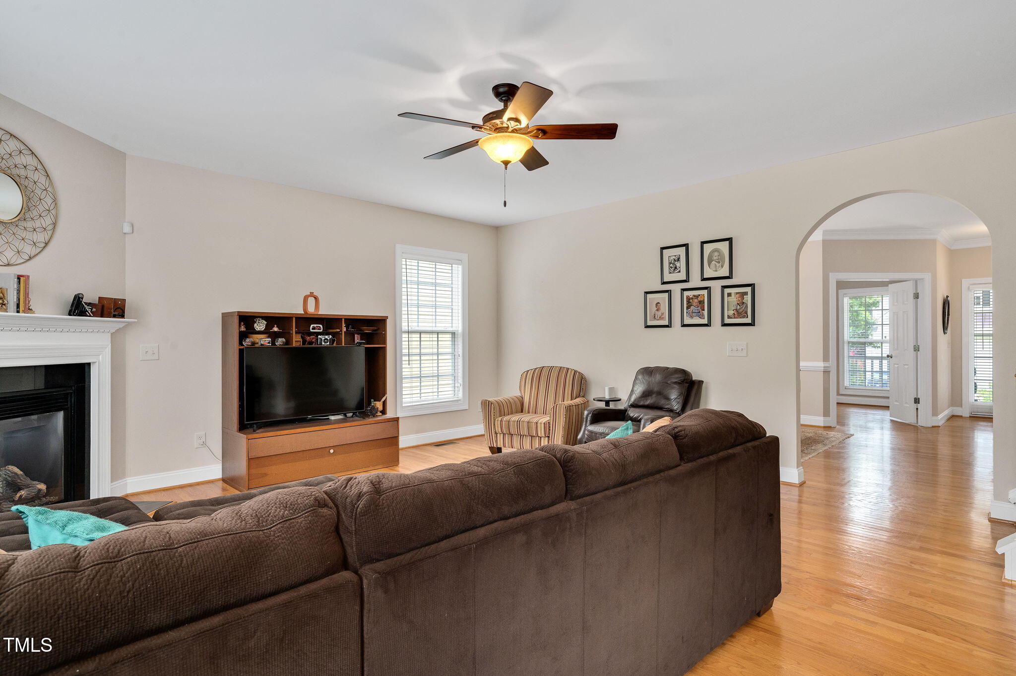 1106 Bellenden Drive Durham, NC 27713 - Photo 10 of 40 a living room with furniture a fireplace and a flat screen tv