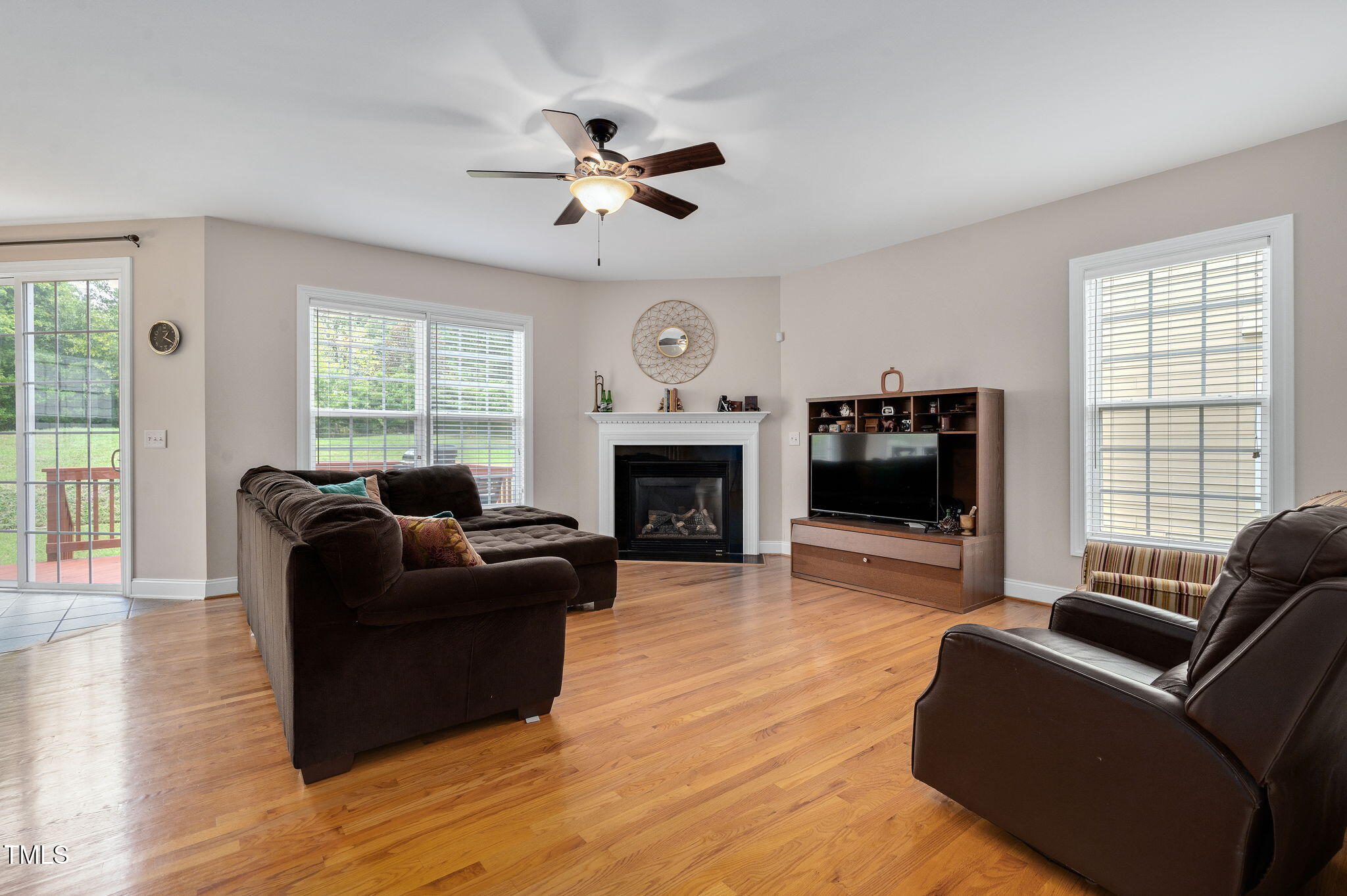 1106 Bellenden Drive Durham, NC 27713 - Photo 11 of 40 a living room with furniture windows and a fireplace