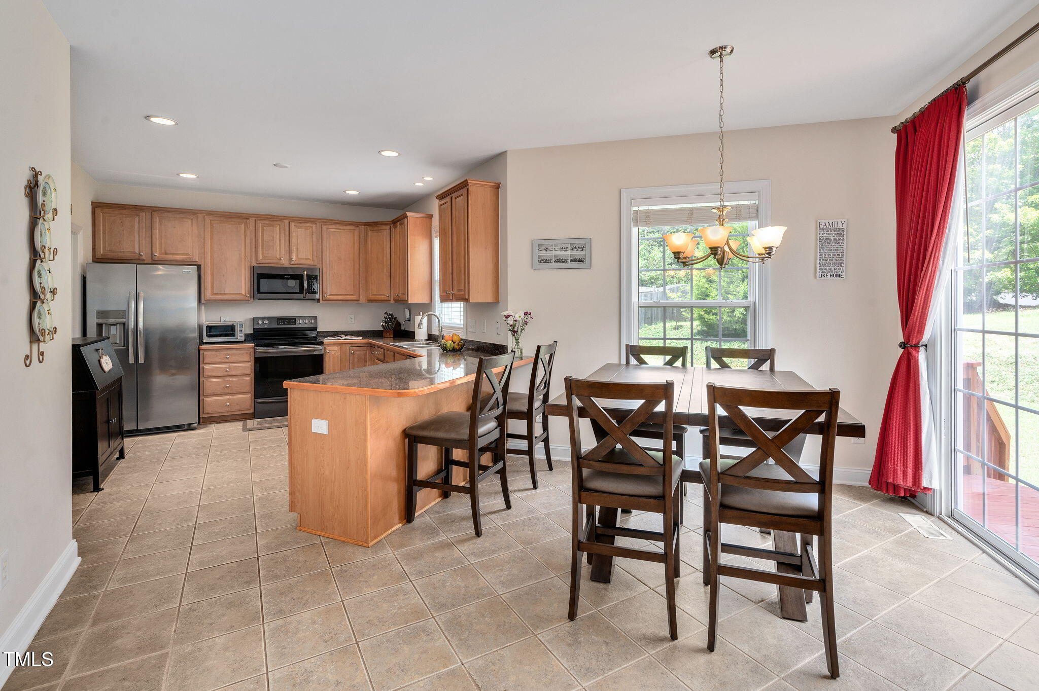 1106 Bellenden Drive Durham, NC 27713 - Photo 13 of 40 a view of a dining room with furniture window and outside view