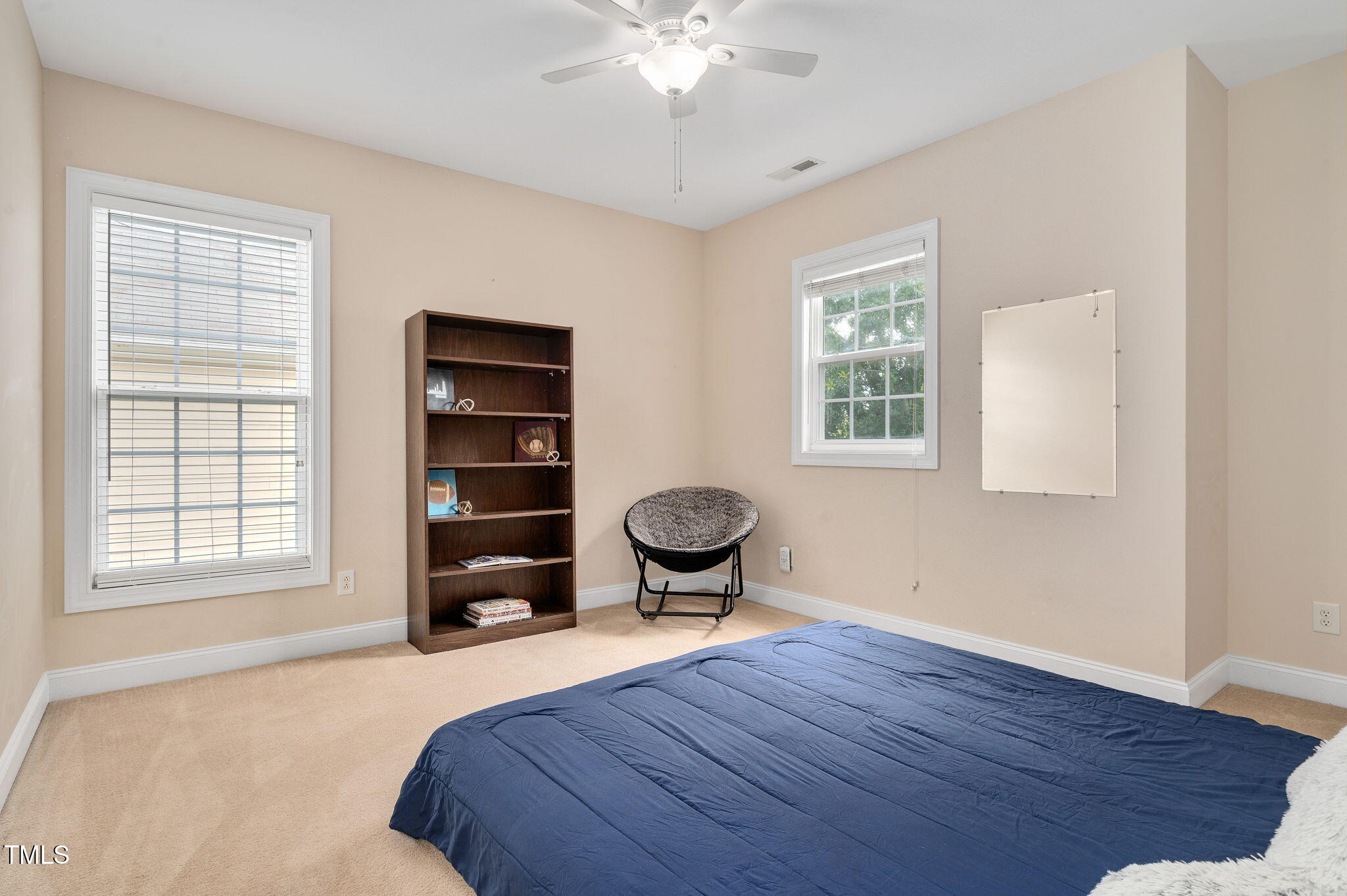 1106 Bellenden Drive Durham, NC 27713 - Photo 21 of 40 a bedroom with a bed and a window
