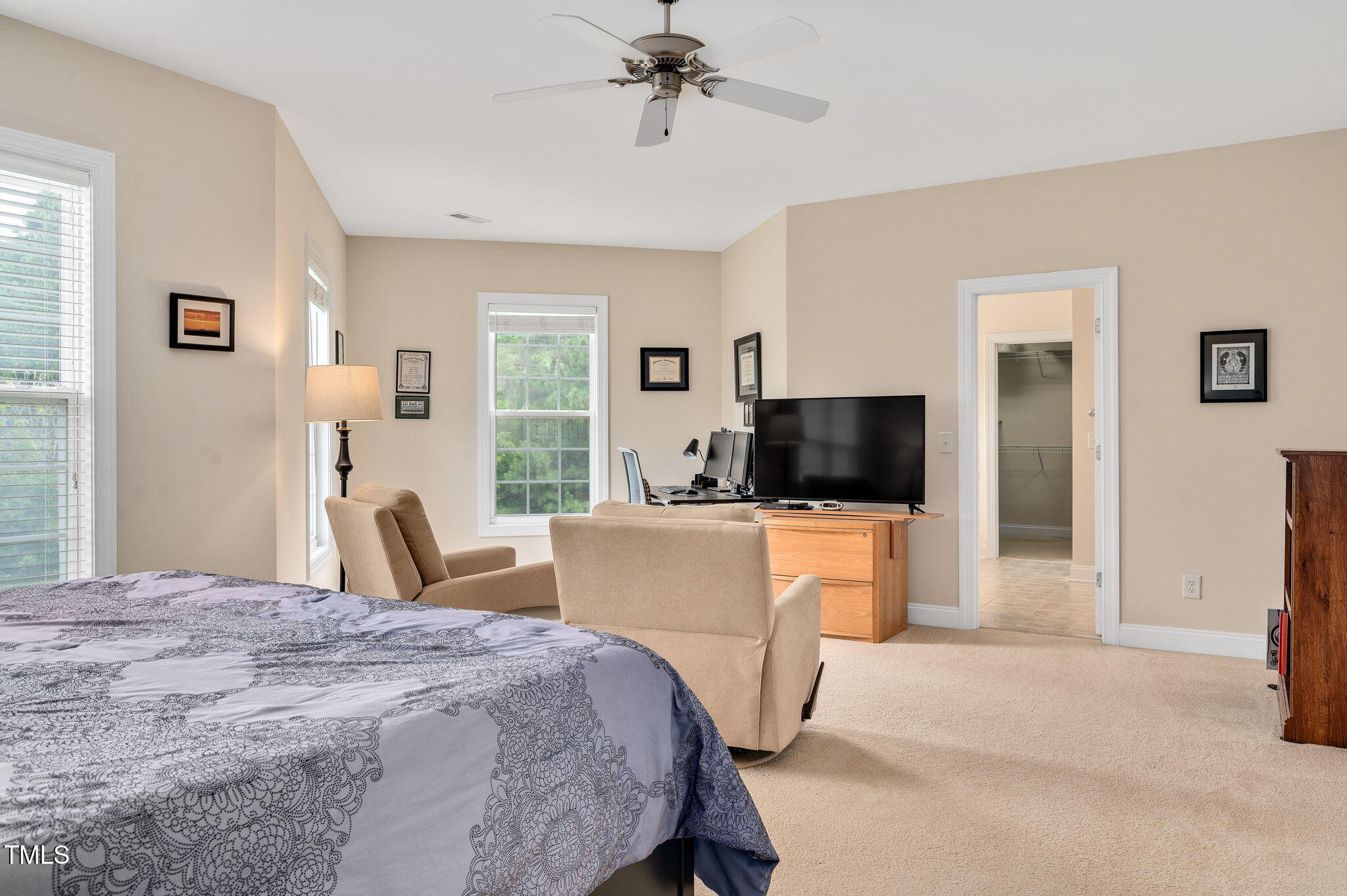 1106 Bellenden Drive Durham, NC 27713 - Photo 25 of 40 a bedroom with a bed and a flat screen tv